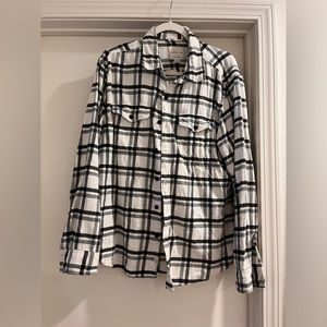 Male black and white flannel shirt from American Eagle.